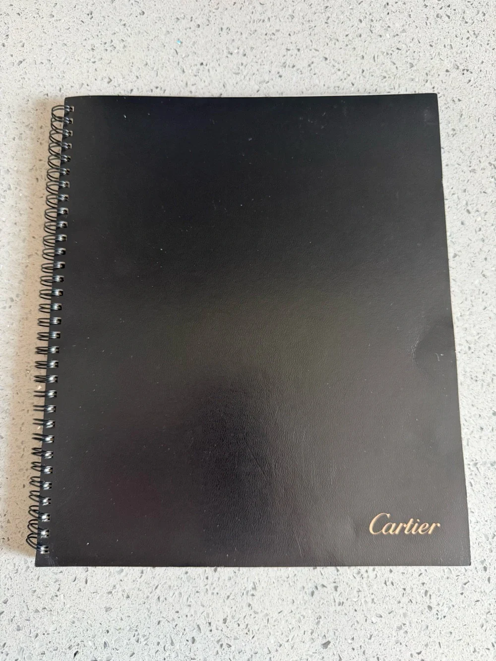 Cartier Black Notebook with Gold Logo